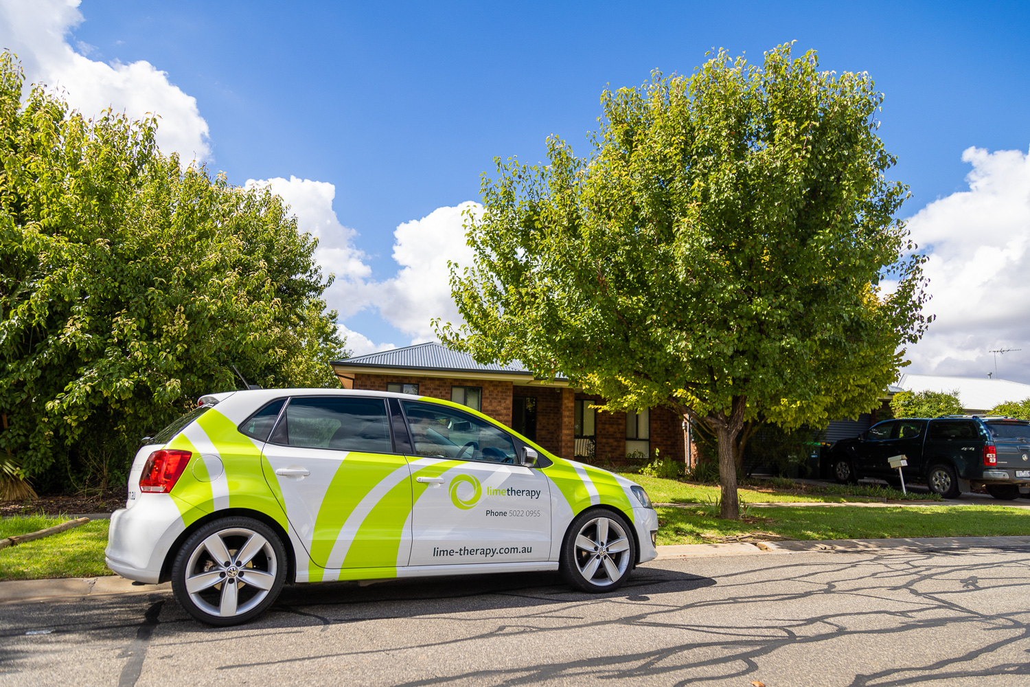 A photo of a Lime Therapy branded vehicle out and about.