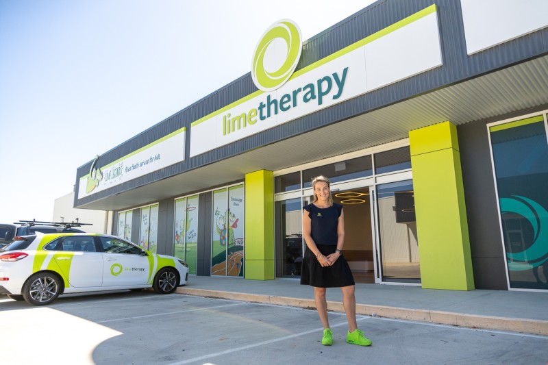 Renee in front of the new Lime Therapy building.